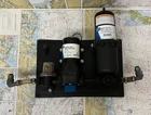 Jabsco Fresh Water Pump Kit #31631-7092/30573-0000 And Accumulator Used. Price: $240.00.