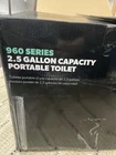 Dometic Sanipottie 962, All-in-one Portable Toilet 301096206 New. Price: $109.00.