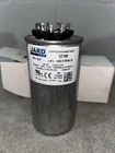 Jard 12790 Dual Run Capacitor 50/5 Mfd 440/370V Round Motor Hvac New. Price: $15.95.
